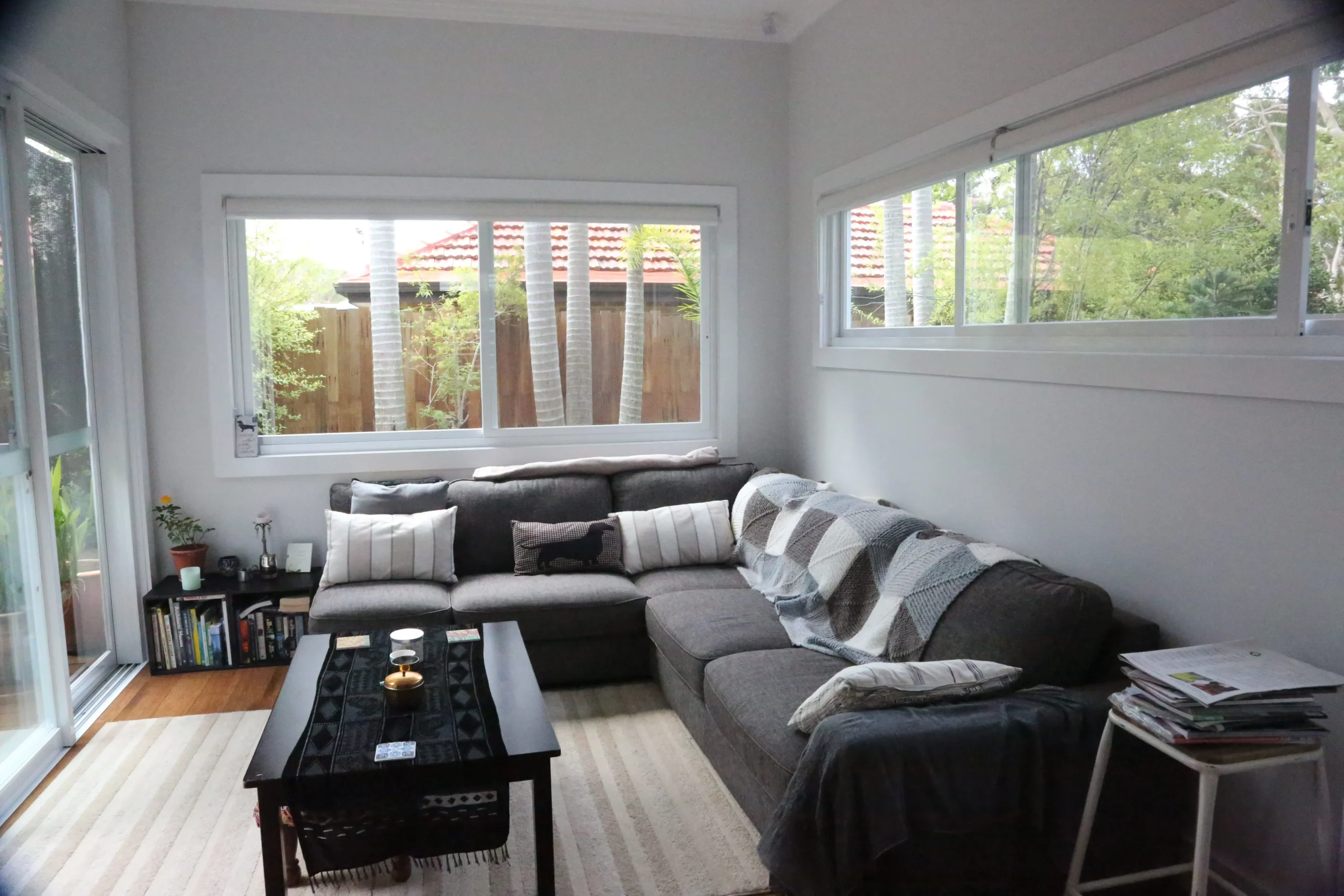 A newly completed 2 bedroom granny flat built in a Sydney backyard showing modern timber cladding and outdoor decking.